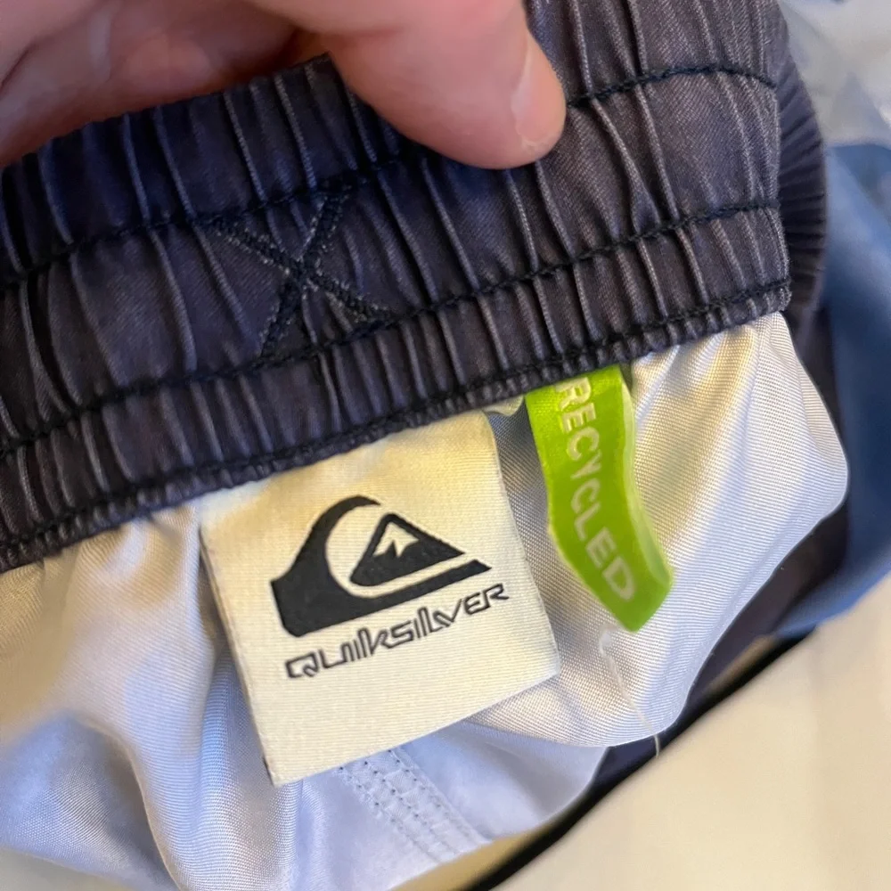Men’s size medium blue striped floral Quiksilver swim trunks